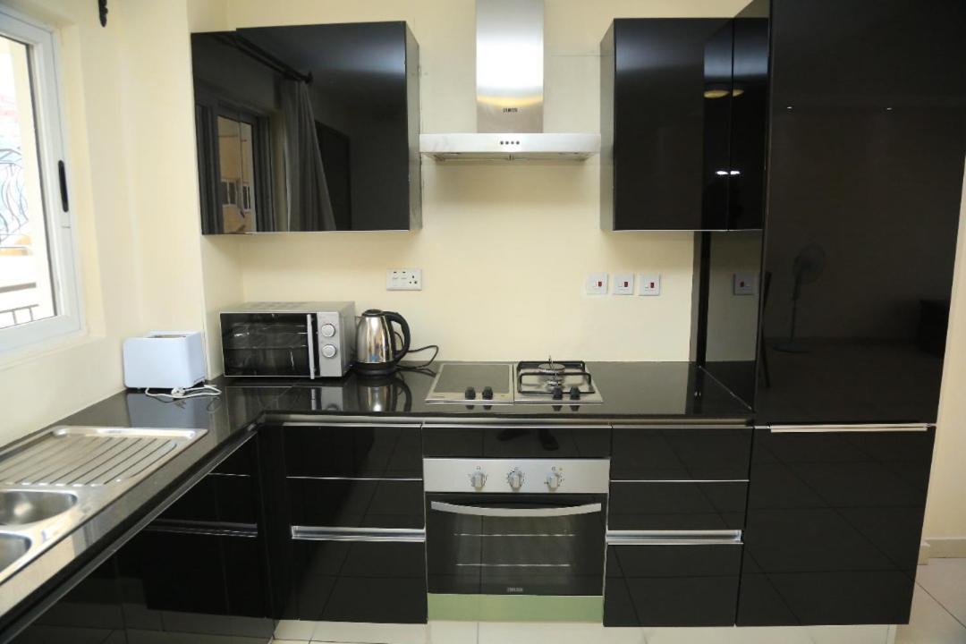 Executive Suites Кигали Экстерьер фото